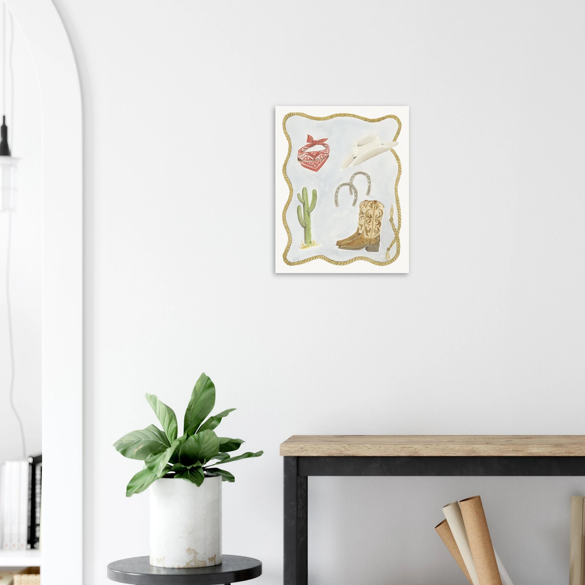 Western watercolor fine art print, Cowboy Keepsakes by Houston based artist Jenny Wagner. Print shown in a Hallway