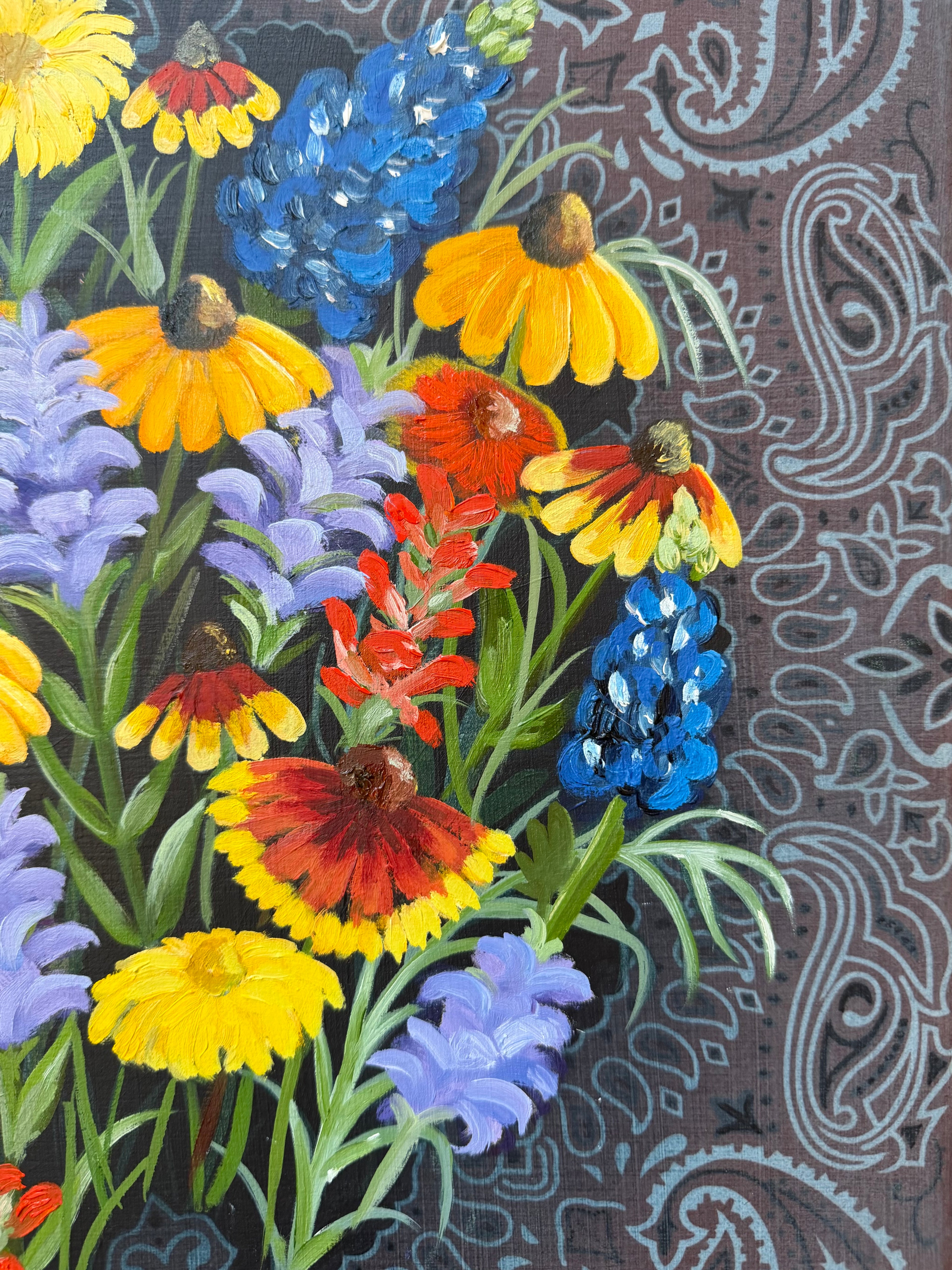 Close up of wildflowers painted in oil on a hand stretched bandana by Texas artist Jenny Wagner