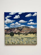 Original acrylic landscape painting titled "Colorado to Utah" featuring colorful mountains beneath bright blue skies and white clouds.