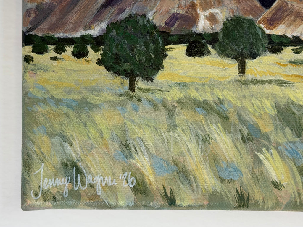 Close up on artist signature of the original 10x10 acrylic landscape painting "Colorado to Utah" by Texas artist Jenny Wagner