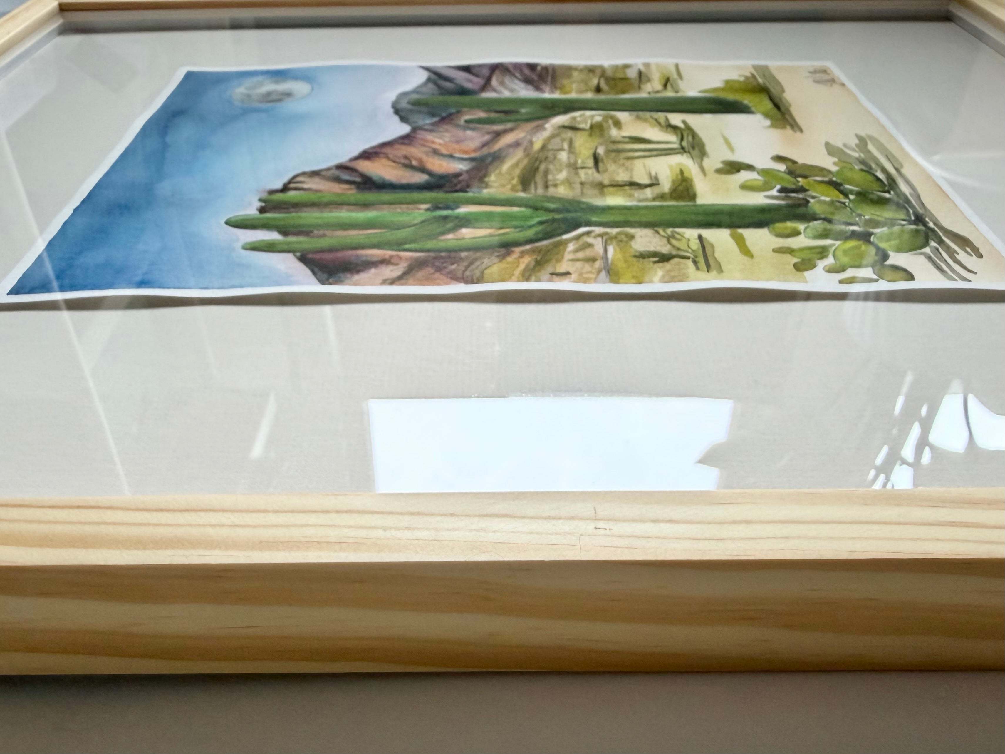 Side view of the framed piece, Desert Moon, by Texas artist Jenny Wagner. 
